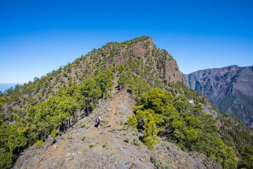 Young woman summit to Bejenado Peak in Caldera de Taburiente, La Palma, Spain