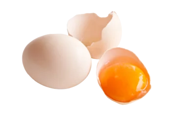 Fototapeten Broken egg and egg yolk close up photo isolated on transparent background, png file © Delphotostock