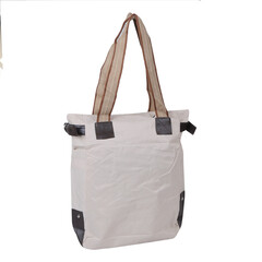 Chic and trendy ladies handbag, elegantly showcased against a pristine white backdrop for maximum...