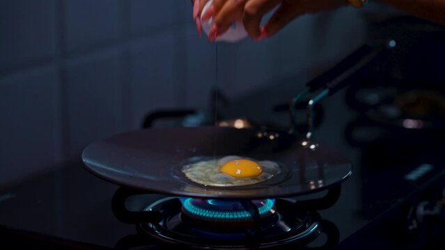 Fried chicken eggs in a hot pan 