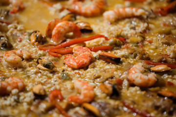 Spanish traditional food paella with seafood, close-up
