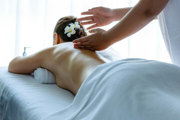 Caucasian woman customer enjoying relaxing anti-stress spa massage and pampering with beauty skin...
