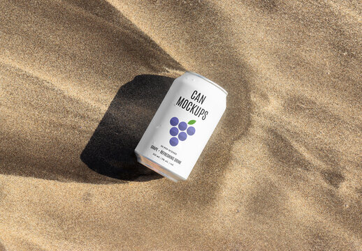 Can Laying on Sand Mockup