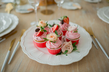cupcake with strawberries and cream