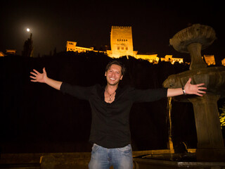 man in his thirties invites night visits to the Alhambra in Granada Spain - 769917445