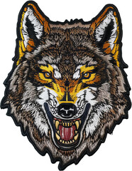 Intricate wolf head embroidered patch with yellow eyes cut out on transparent background
