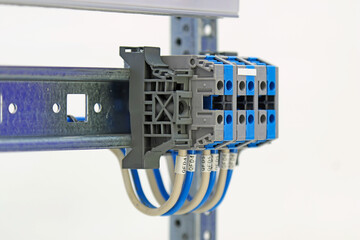 Electrical pass-through terminals for connecting copper mounting wires in an electrical...