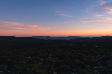 Panoramic view of the silhouette of the mountains against the sky at sunset. Galicia - Spain