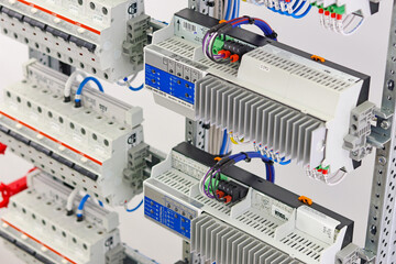 The  electronic module for automatic control is installed in an electrical distribution cabinet.