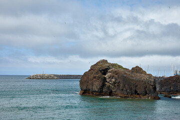 View of the volcanic rocks from the beach of Vila Franca do Campo in San Miguel, Azores, Portugal