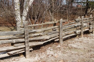 Old weathered wooden fence in the country