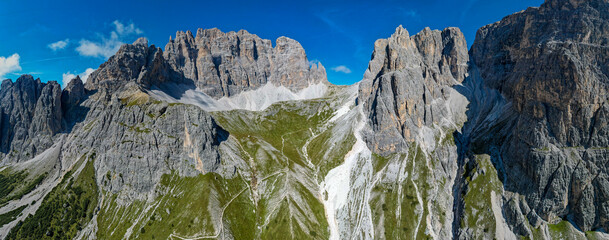 Tre Cime di Lavadera from above - Aerial view of the epic mountains in the Dolomites Italy 