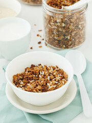 Home made granola in white bowl