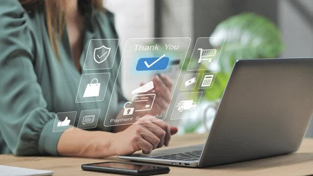 shopping online secure banking transaction,woman at computer making wireless credit card payment,female at home at the computer pay purchase,using virtual screen graphic interface