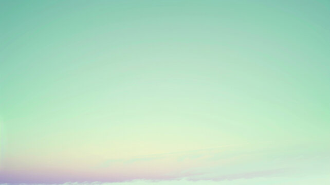 A soft gradient background transitioning from mint green to lavender, giving the impression of a serene, early morning sky. The image is slightly blurred, 