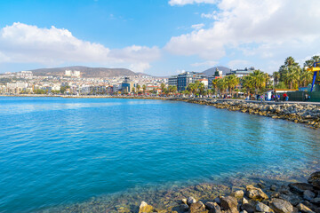 The seaside city of Kusadasi, Turkey, a beach resort town on Turkey’s western Aegean coast and a...