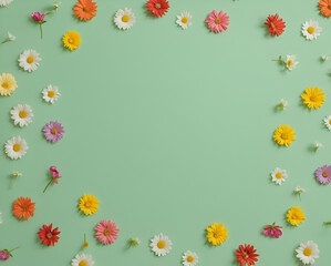 Fototapeta premium This image features a lively border of various colorful flowers set against a soft pastel blue backdrop. Minimal concept of love and romance. Copy space. Flat lay. Floral frame.