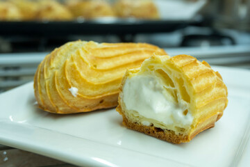 profiteroles, eclairs, choux pastry. Dessert. food concept. diet