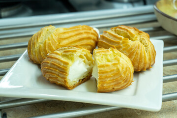 profiteroles, eclairs, choux pastry. Dessert. food concept. diet