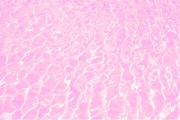 Fantastic Pink Water Surface with Bubles and Bright Summer Sunlight Reflections.  Background of Pink Water in Swimming Pool