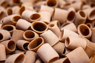 Italian food, dried handmade colorful pasta  with walnuts, ready to cook, Milan, Lombardy, Italy