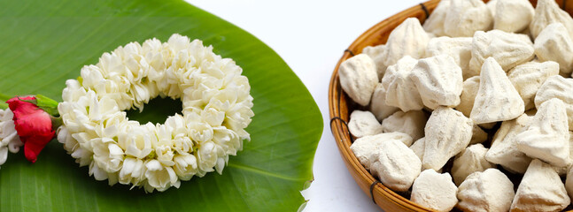 Jasmine garland with white clay filler, Soft-prepared chalk.  Thai tradition, Songkran festival