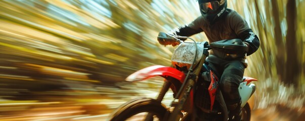 Off-road motorcycle in motion blur with forest blured in background. banner.