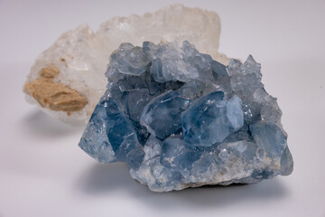 White and blue mountains crystal of colorless gemstone quarts, geology mineral background close up