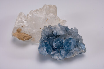 White and blue mountains crystal of colorless gemstone quarts, geology mineral background close up