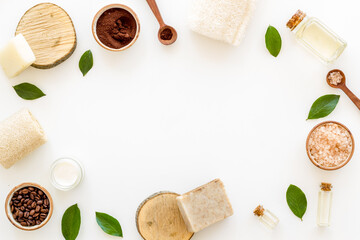 Flat lay of organic spa care cosmetic with coffee soap and scrub