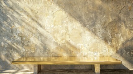 Golden table against textured wall backdrop - A minimalistic composition featuring a sleek golden table against a richly textured concrete wall, illuminated by sunlight