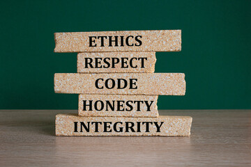 Code of conduct symbol. Brick blocks with words 'ethics, respect, code, honesty, integrity'....