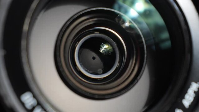 Camera lens close-up. Take a picture with a camera.