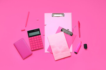 Composition with different office stationery on pink background