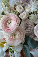wedding bouquet of soft pink ranunculuses