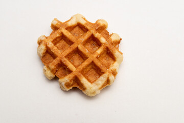cookies on a white background,Belgian waffle isolated on white background, sugar waffles tasty dessert, appetizing and tasty