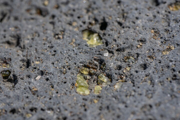 Olivine in basalt comes from the Koʻolau volcano in eastern Oahu, Hawaii, and is about 1.8 million to 3 million years old. Makapuu point  Honolulu Geology