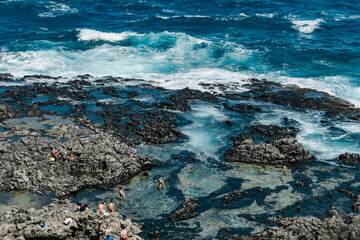 Makapuʻu Tide Pools, basalt comes from the Koʻolau volcano in eastern Oahu, Hawaii Geology. Waves...