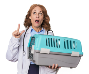 Mid-aged Caucasian vet with carrier pointing upside with opened mouth.