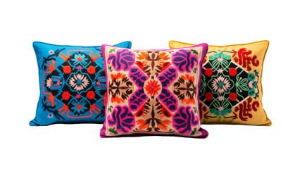 Three colorful pillows in shades of blue, pink, and yellow are displayed on a clean white background