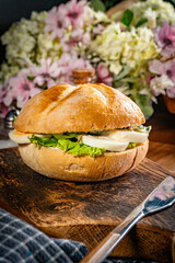 Sandwich with lettuce and boiled egg.