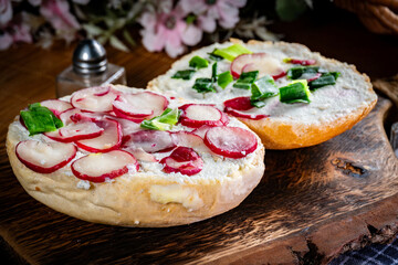 Sandwich with cheese, radish and chives.
