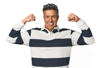 Middle-aged Latino man showing strength gesture with arms, symbol of feminine power