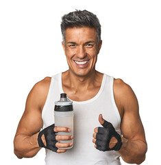 Gym-ready Hispanic man with water bottle smiling and raising thumb up