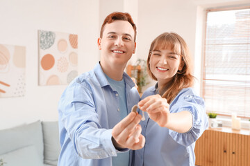 Young couple with hearing aid at home