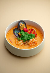 The restaurant serves bowls, sushi, and ramen, representing Pan-Asian cuisine