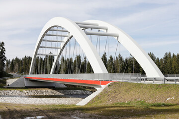 A modern bridge over the mountain river.