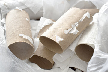 Tissue paper cores in plastic bag.
