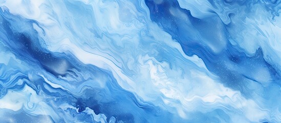 A close up of a blue and white marble texture resembling a swirling cloud formation in the sky. The...