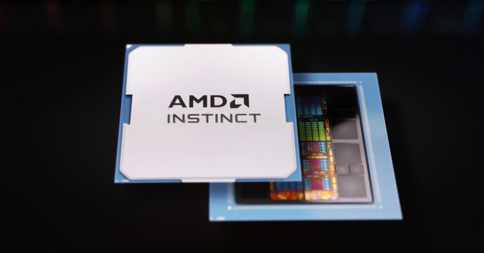 Viersen, Germany - March 9. 2024: Closeup of smartphone on computer keyboard with logo lettering of AMD Instinct GPU chip